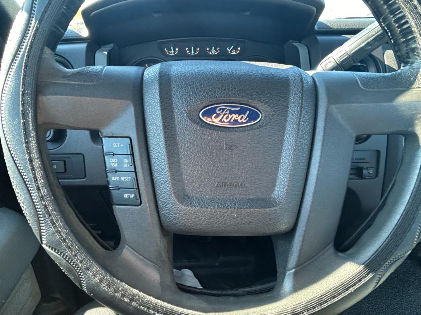 2011 White /Gray Ford F-150 STX 6.5-ft. Bed 2WD (1FTPF1CF1BK) with an 5.0L V8 OHV 16V engine, 4-Speed Automatic transmission, located at 17760 Hwy 62, Morris, OK, 74445, (918) 733-4887, 35.609104, -95.877060 - 2011 FORD F-150 HAS THE 5.0L V8 AND IS RWD. FEATURES POWER LOCKS, POWER WINDOWS, POWER MIRRORS, AM/FM STEREO, SIRIUS STEREO CD PLAYER, AUXILLARY PORT, BED LINER, CRUISE CONTROL, TRACTION CONTROL, MULTI-FUNCTION STEERING CONTROL. A PREMIER ALTERNATIVE FUEL CONVERSION THAT IS EPA-APPROVED. EXTREMELY C - Photo#13